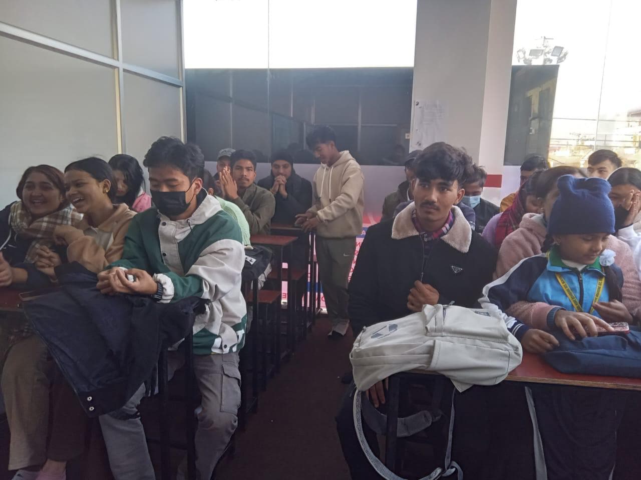 Students seated at desks during a class session